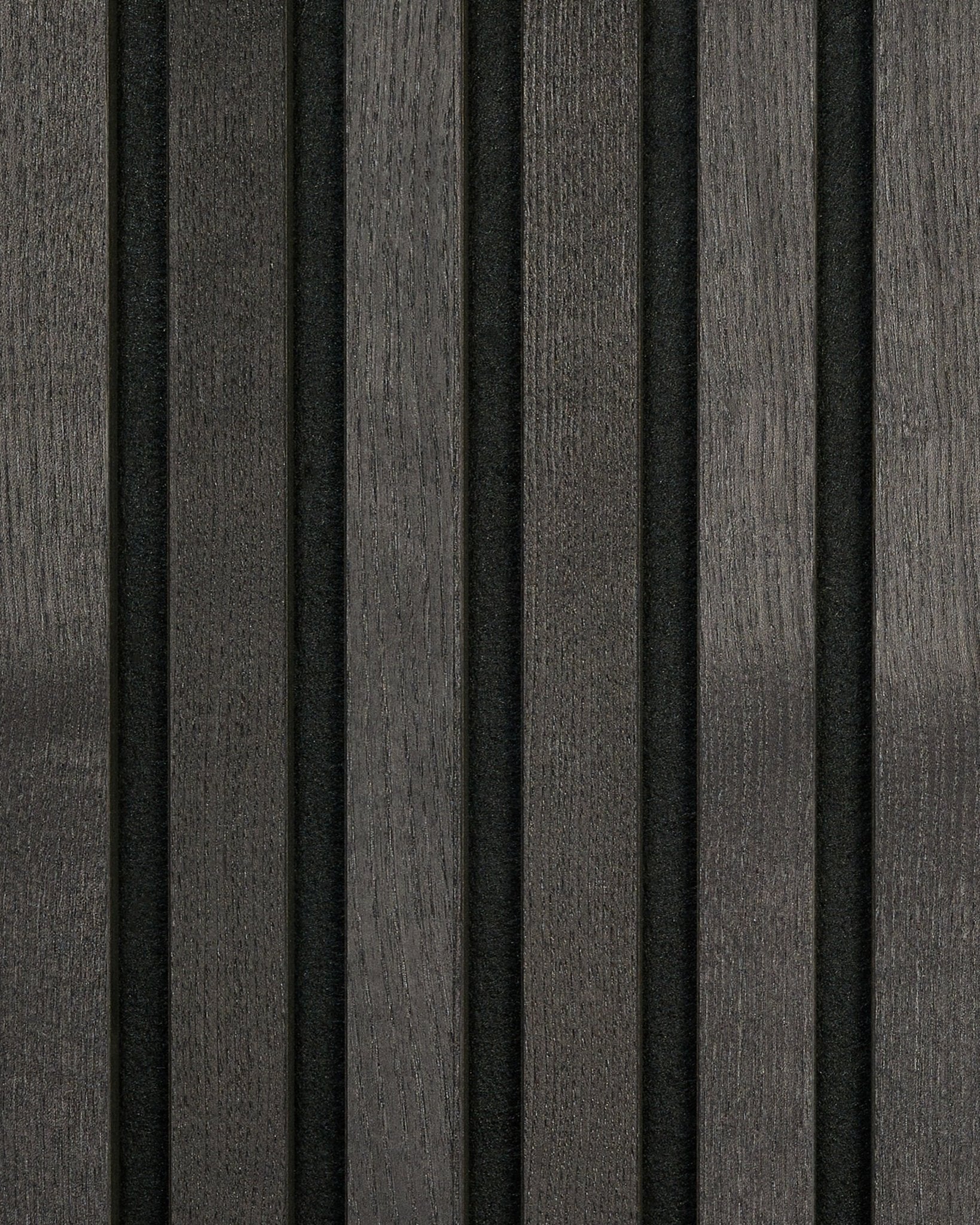 WoodUpp Tonal Black Ash Akustikpanel-prov med mörka vertical trälameller och smala black mellanrum, vilket skapar en randig, minimalistisk nordisk design.